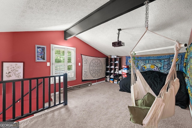 bedroom featuring carpet, vaulted ceiling with beams, and a textured ceiling