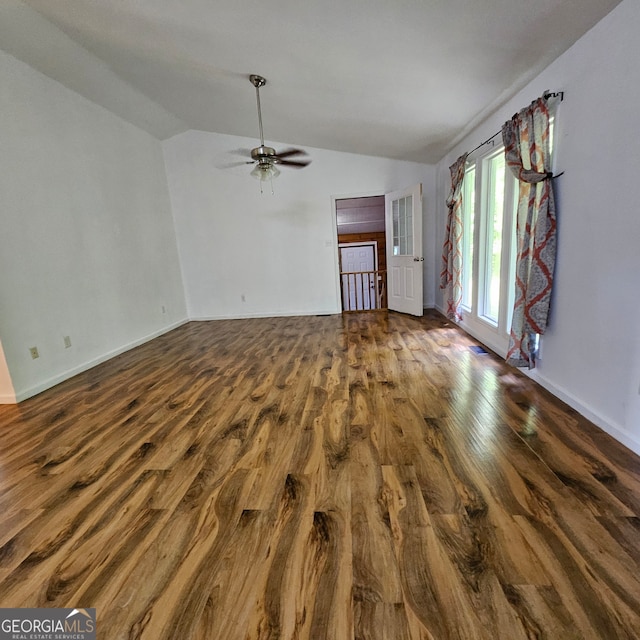 unfurnished living room with lofted ceiling, ceiling fan, and hardwood / wood-style floors