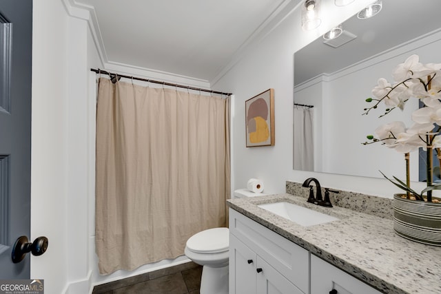 bathroom with tile patterned flooring, toilet, vanity, and ornamental molding