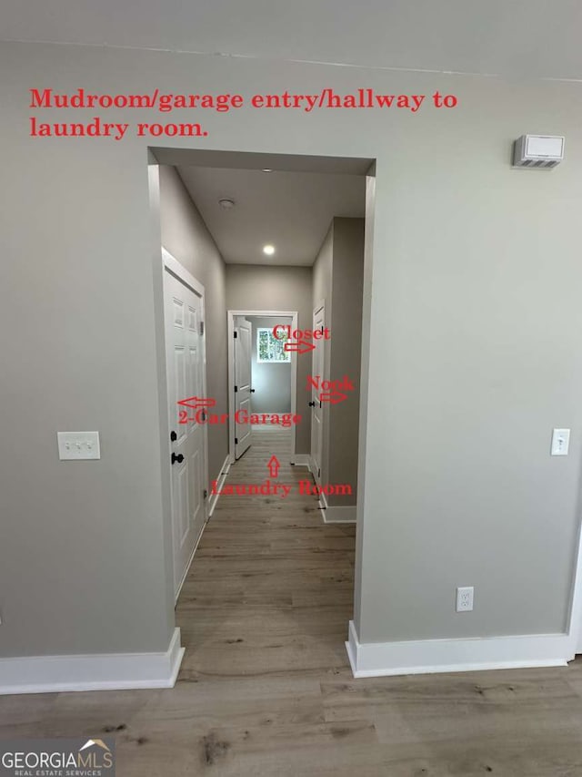 hallway featuring hardwood / wood-style floors