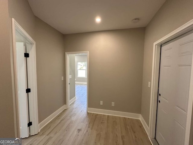 hallway featuring light hardwood / wood-style flooring