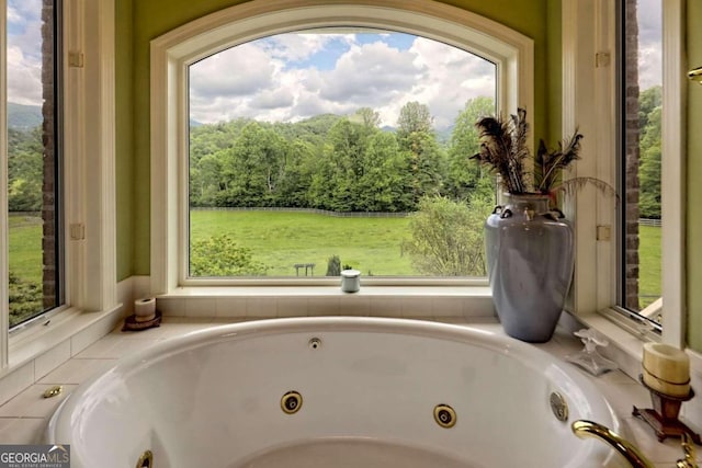 bathroom with a tub