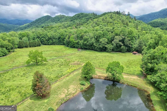 mountain view featuring a water view and a rural view