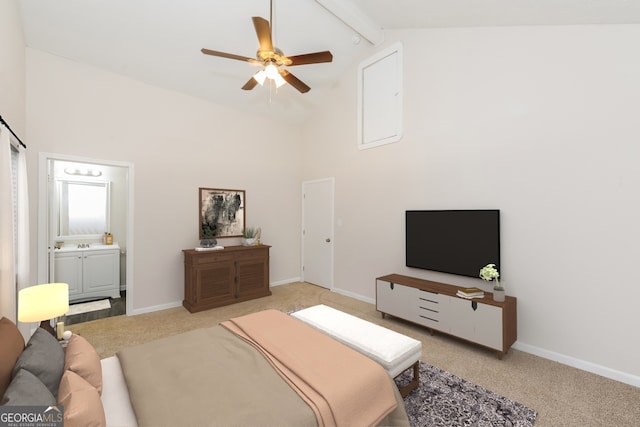 bedroom with light carpet, ceiling fan, ensuite bath, high vaulted ceiling, and beam ceiling