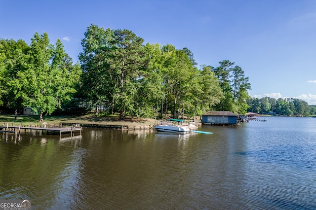 property view of water featuring a boat dock