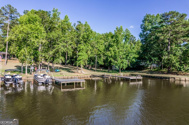 dock area featuring a water view