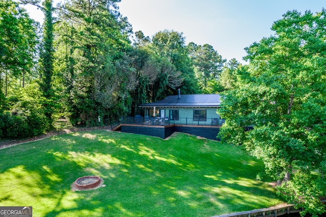 view of yard with a wooden deck