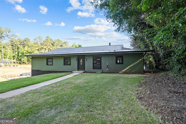 ranch-style home with a front yard