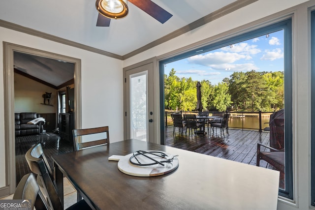 dining space with hardwood / wood-style flooring, ceiling fan, and ornamental molding