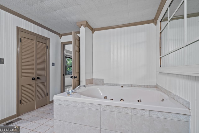 bathroom with a relaxing tiled tub, tile patterned floors, and ornamental molding