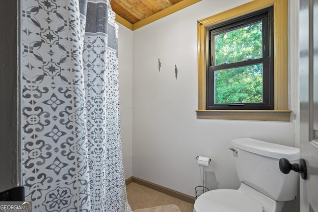 bathroom with toilet, lofted ceiling, and wood ceiling