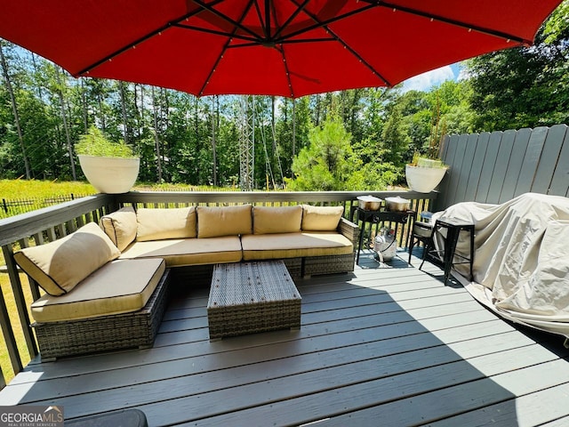 deck featuring an outdoor living space