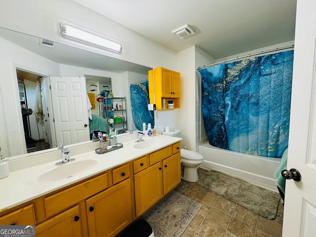 full bathroom featuring double sink vanity, tile patterned flooring, toilet, and shower / bath combination with curtain