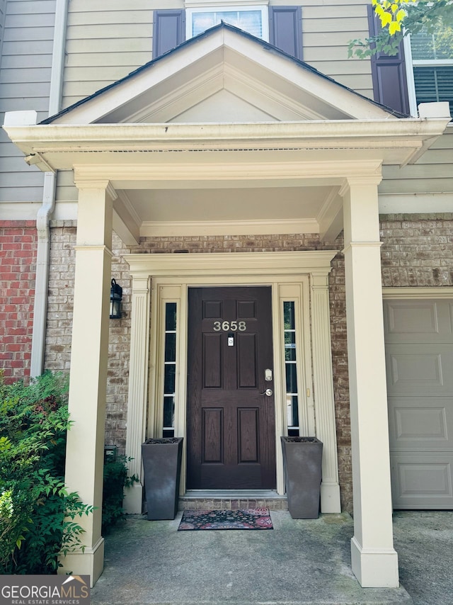 entrance to property with a garage