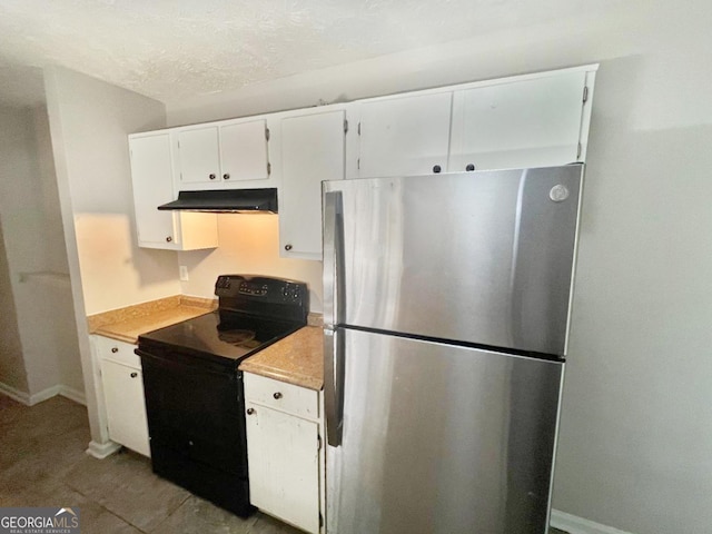 kitchen with white cabinetry, black electric range, stainless steel fridge, and a textured ceiling