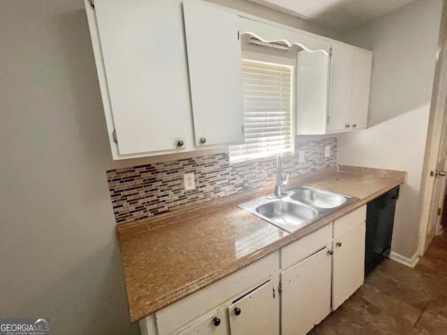 kitchen with dishwasher, sink, white cabinets, and backsplash