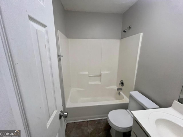 full bathroom with vanity, bathtub / shower combination, and toilet