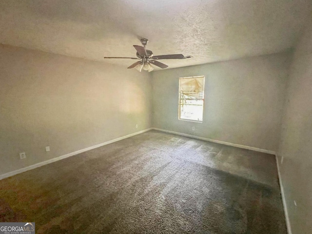 unfurnished room featuring a textured ceiling, ceiling fan, and carpet