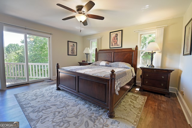 bedroom featuring access to outside, ceiling fan, and dark hardwood / wood-style floors