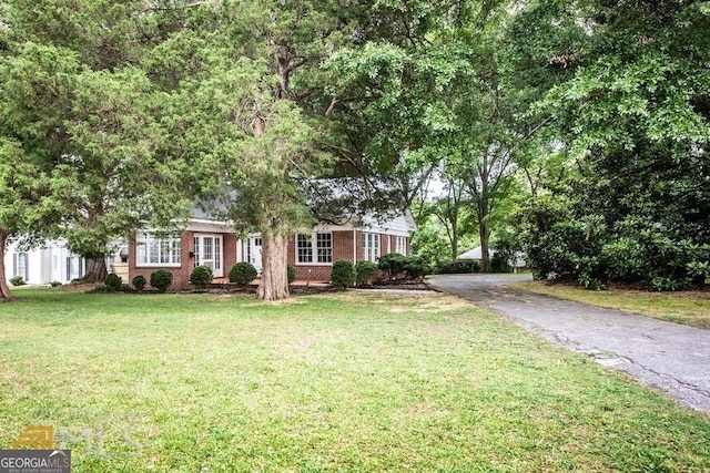 view of front of home with a front yard