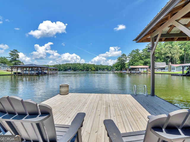 dock area with a water view