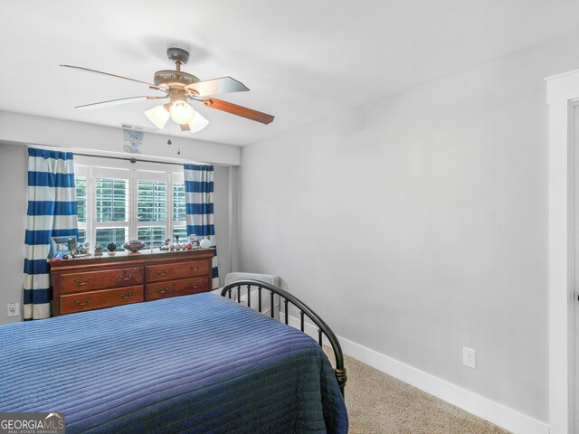 bedroom featuring carpet and ceiling fan