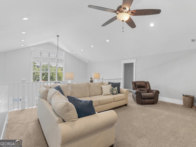 living room with vaulted ceiling, carpet, and ceiling fan