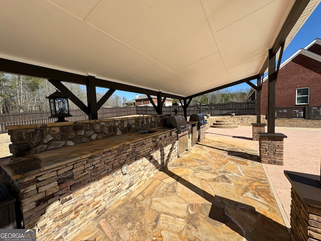 view of patio / terrace with a gazebo and area for grilling