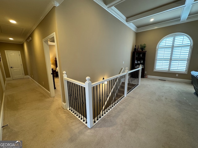 hall featuring beamed ceiling, coffered ceiling, carpet, and ornamental molding