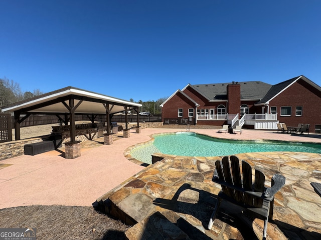 view of pool featuring a patio