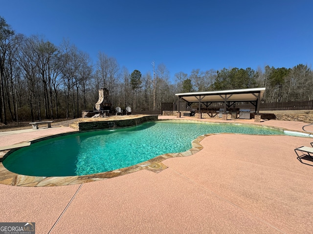 view of pool with a patio area