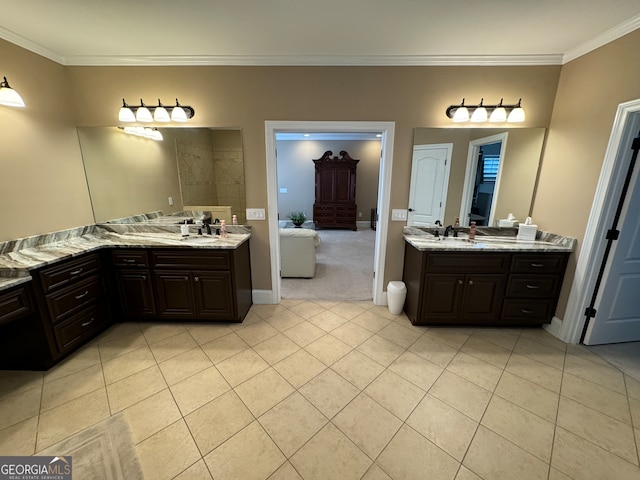 bathroom with dual bowl vanity, tile flooring, and crown molding