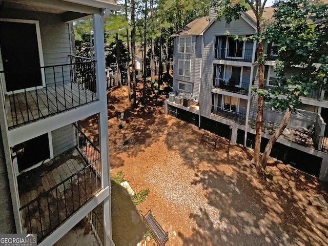 view of yard featuring a balcony