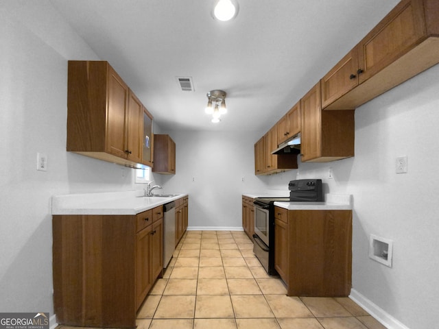 kitchen featuring light tile patterned floors, black range with electric cooktop, stainless steel dishwasher, and sink