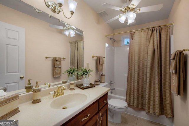 full bathroom featuring tile patterned flooring, ceiling fan, shower / bathtub combination with curtain, vanity, and toilet