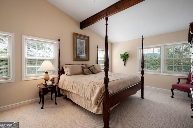 bedroom featuring multiple windows, light carpet, and vaulted ceiling with beams