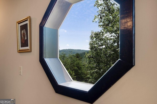 room details with a wooded view