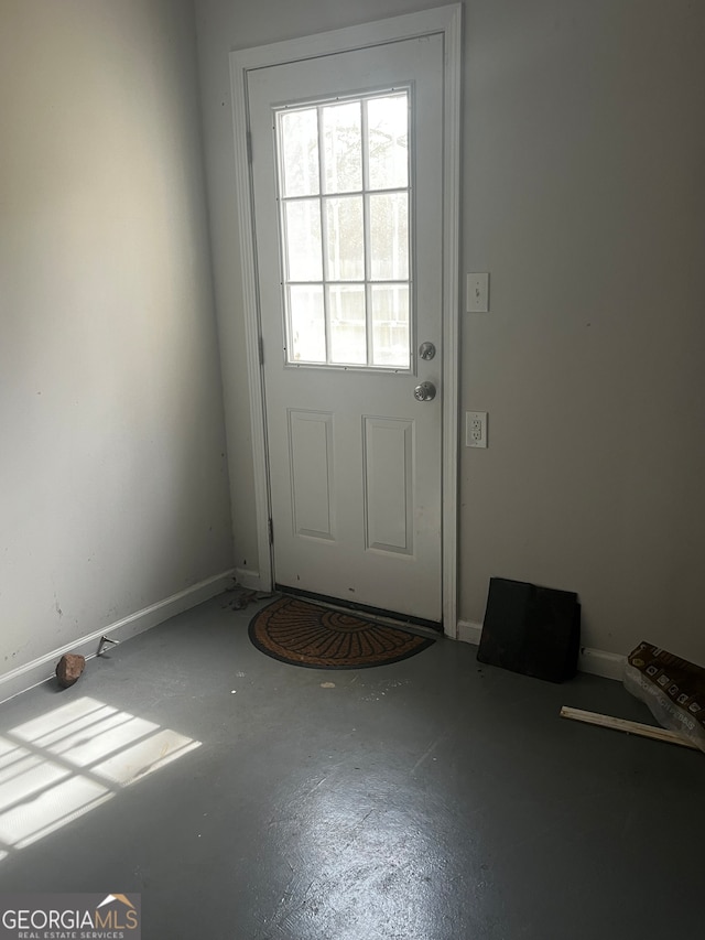 entryway featuring concrete flooring