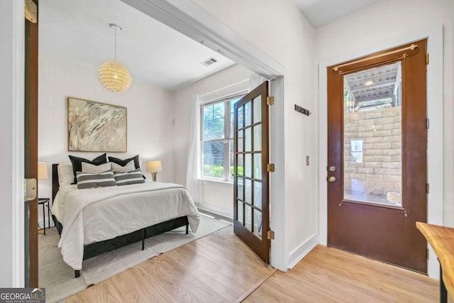 bedroom featuring light hardwood / wood-style floors