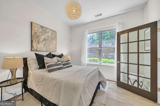 bedroom featuring light hardwood / wood-style floors