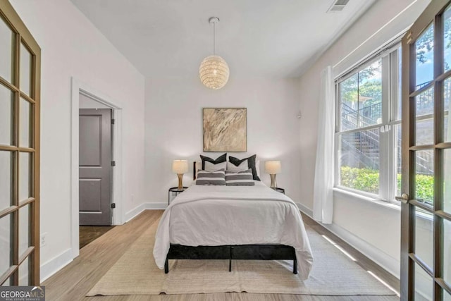 bedroom featuring light hardwood / wood-style floors