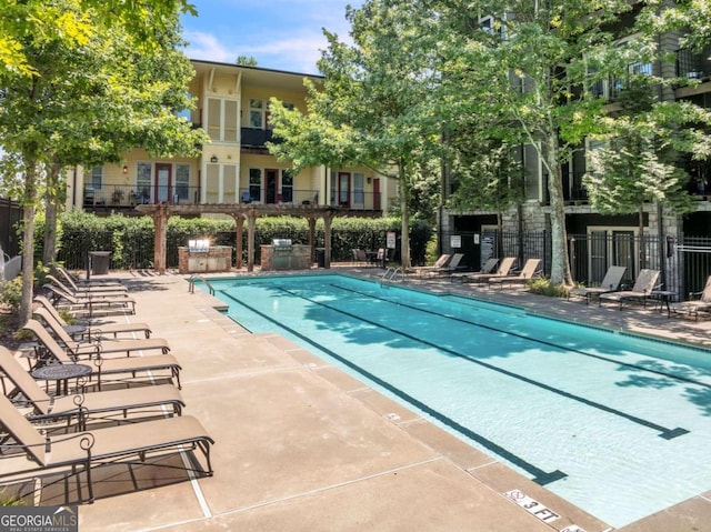 view of pool with a patio area