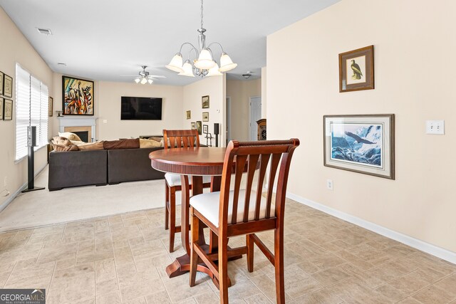 living room featuring ornamental molding and carpet flooring