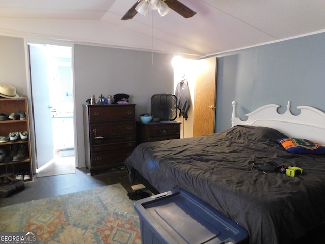 bedroom featuring ceiling fan and vaulted ceiling