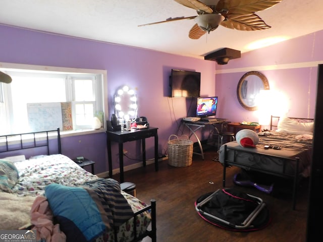 bedroom featuring ceiling fan and hardwood / wood-style flooring