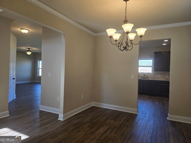 empty room with dark hardwood / wood-style flooring