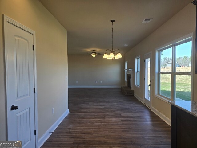 spare room with dark hardwood / wood-style flooring