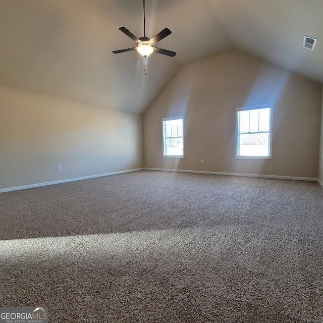 bonus room featuring ceiling fan, carpet, and high vaulted ceiling