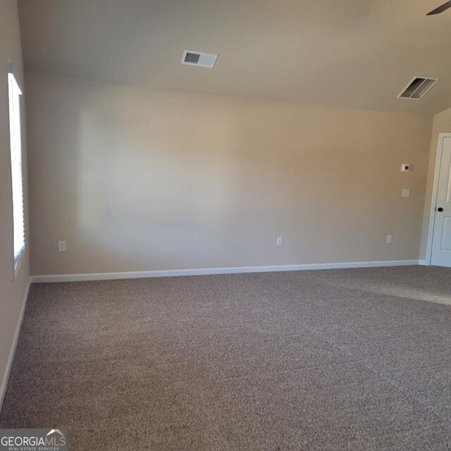 view of carpeted spare room