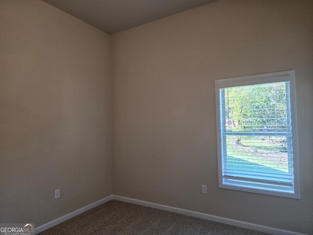 view of carpeted spare room